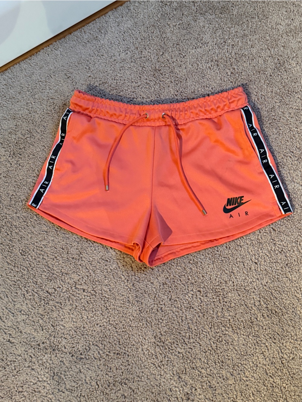 Nike Women's Bright Orange Athletic Shorts with 'Air' Side Tape